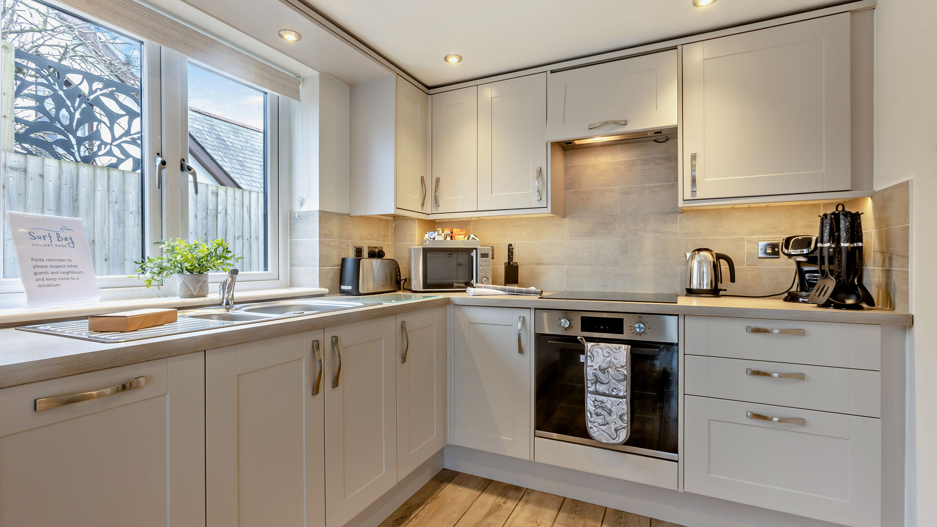 the modern kitchen in the Sandymere apartment